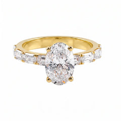 3.25 CT Oval Cut Ring With East West Emerald Side Diamonds
