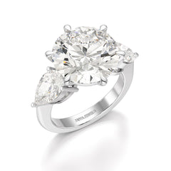 9.13 CT Lab Diamond Round and Pear Cut Three Stone Ring