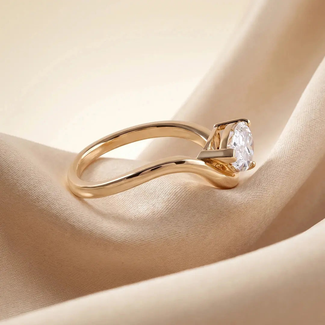 1.05 CT East West Pear Cut Diamond Curve Ring