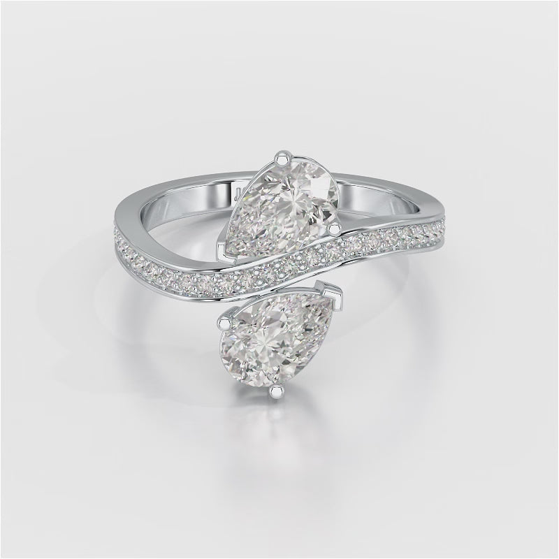 1.55 CT Pear Cut Ring with Round Cut Side Diamonds