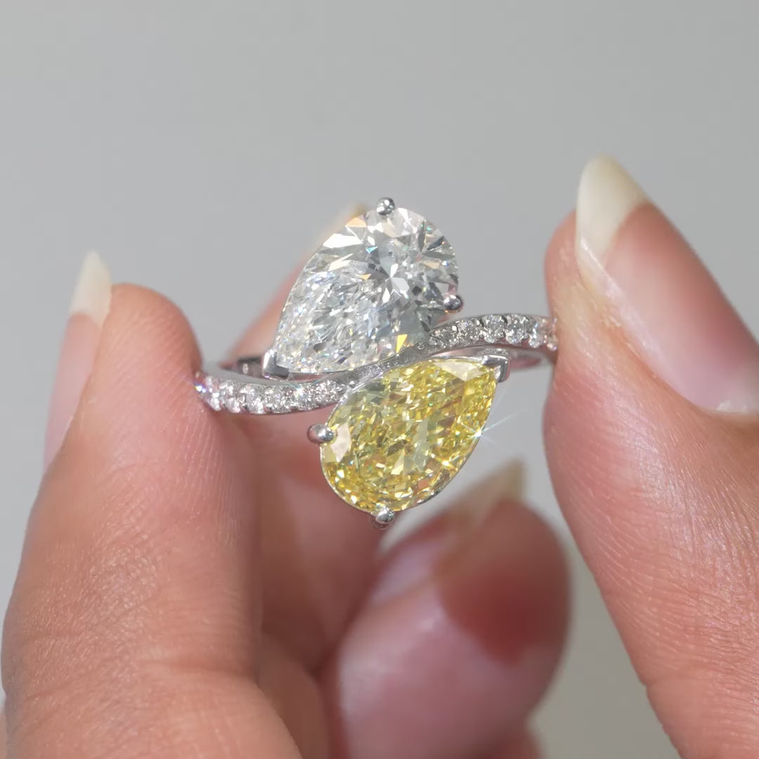 Handshot Video of 4.26 CT Pear Cut Two-Tone Bypass Diamond Ring